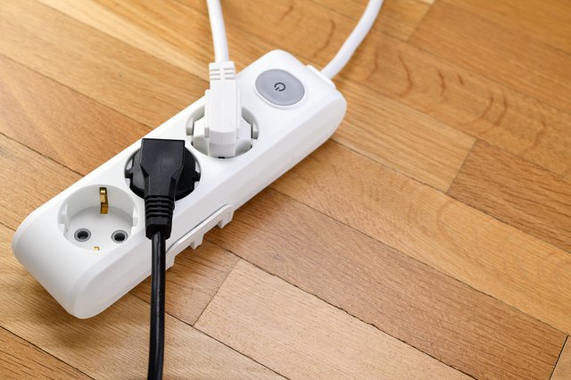 extension cord - Is it safe to mount a surge protector strip