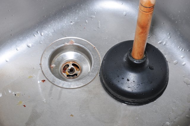 is-my-garbage-disposal-stuck-or-dead-hunker