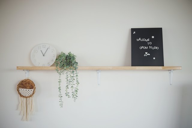 how-to-hang-shelves-on-plaster-walls-hunker