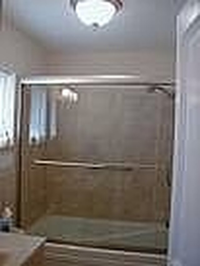 How To Clean A Glass Shower And Keep It That Way Hunker Glass Shower Doors Can Be Great Until You Have To Clean Them