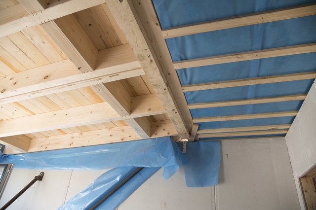 Heat isolation in a new prefabricated house with mineral wool.