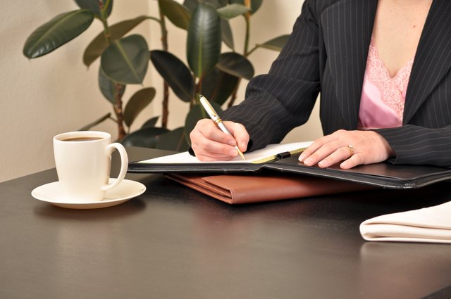 Woman at business meeting over coffee