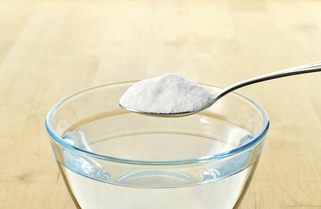 Close-up of baking soda on spoon.