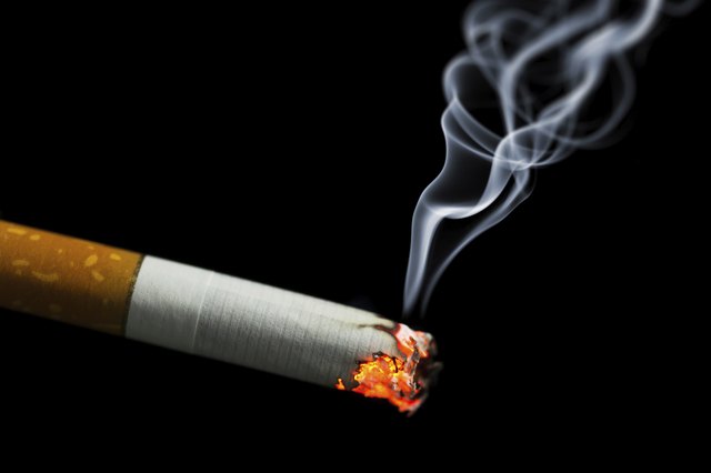 burning cigarette with smoke
