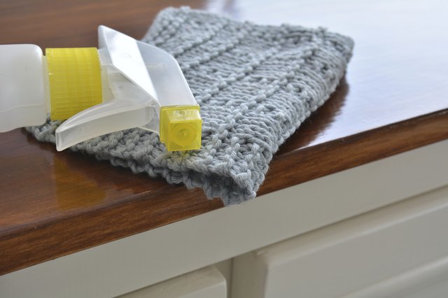 Blue wash cloth with spray cleaner