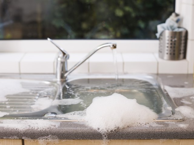 Overflowing kitchen sink