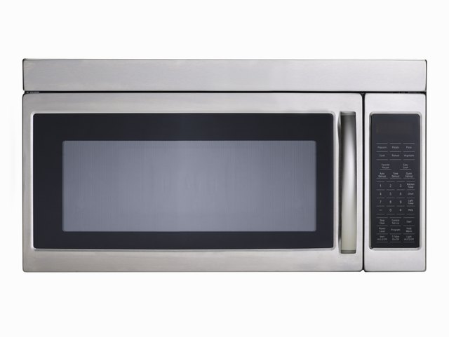Stainless steel microwave oven on white