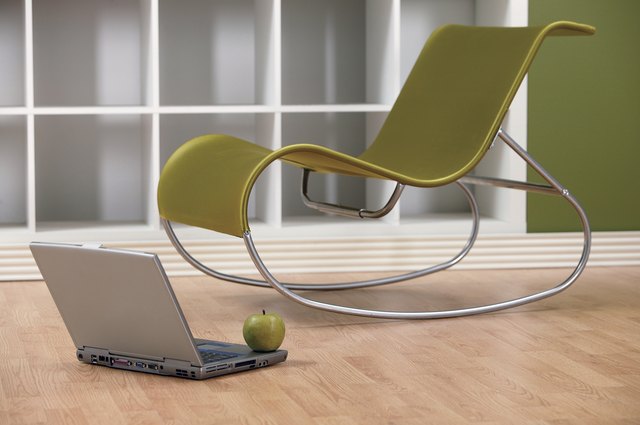 Modern Chair with laptop and apple