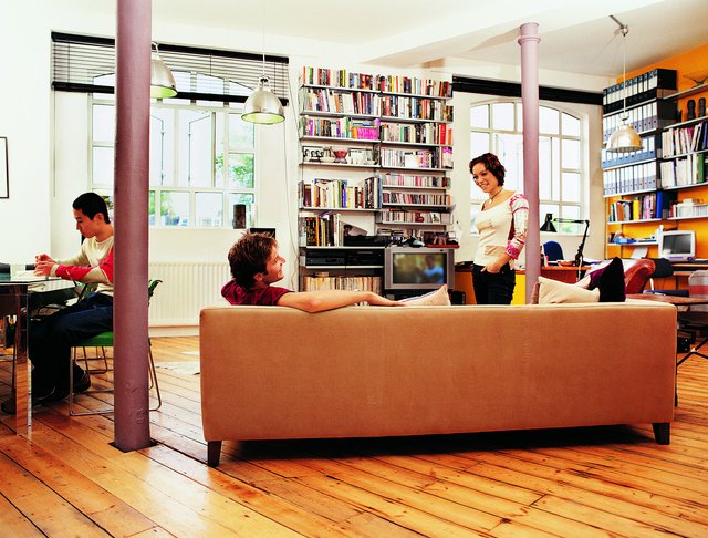 Three Friends Relaxing in an Apartment