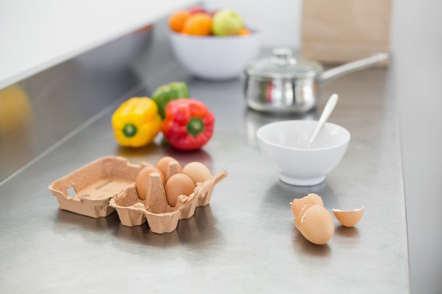 Vegetables and eggs lying on the work surface