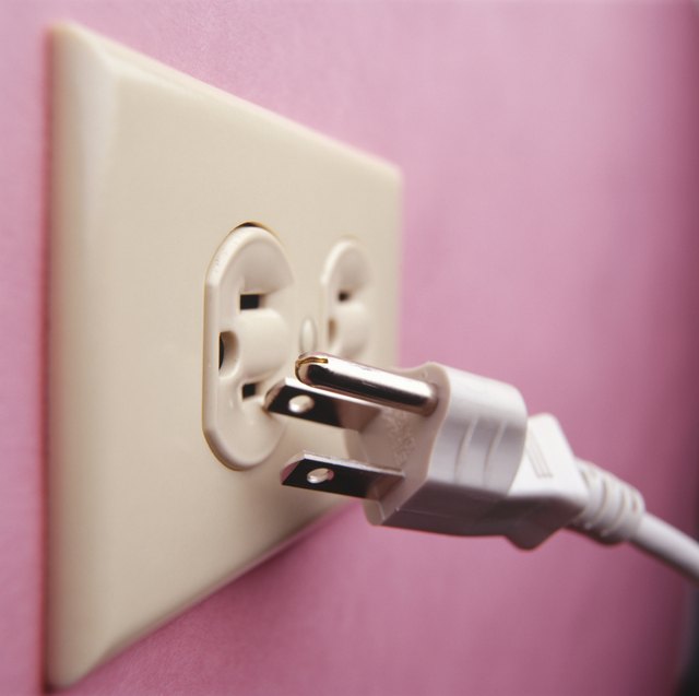 Plug and electrical outlet, (Close-up)