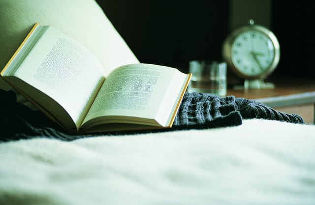 Open Book on Bed