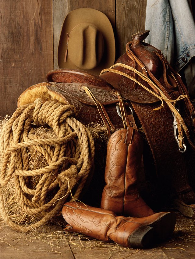 Photo, saddle, rope, boots and hat, Color