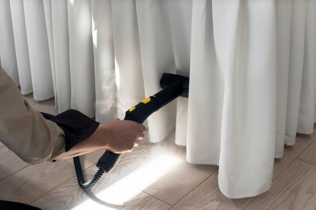 ironing with garment steamer