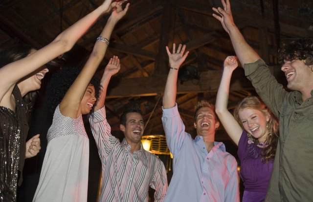 Friends dancing in nightclub