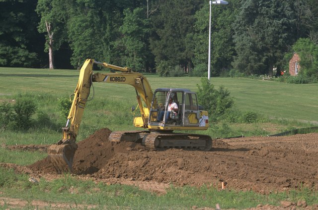 chronicles-of-the-long-shot-farm-installing-drain-tiles