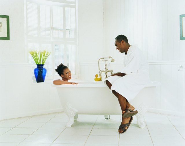 Couple Sitting in a Bathroom