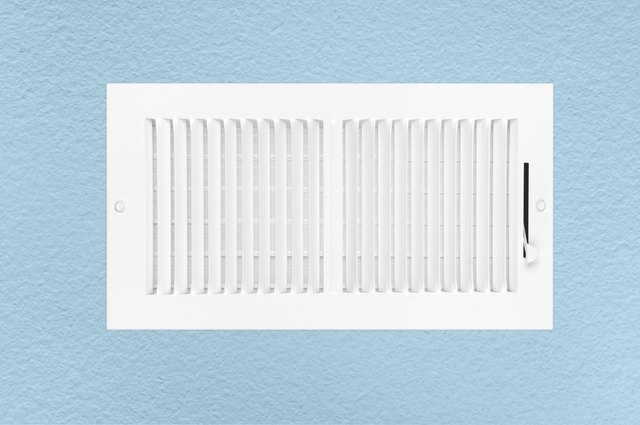 Air conditioning and heating vent on wall