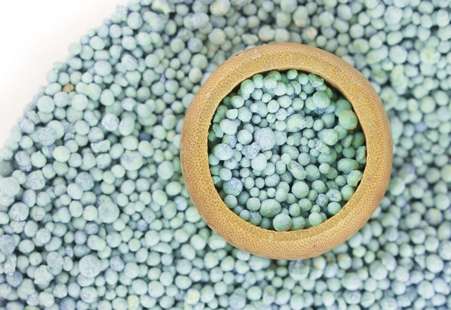 Blue fertilizer on white background