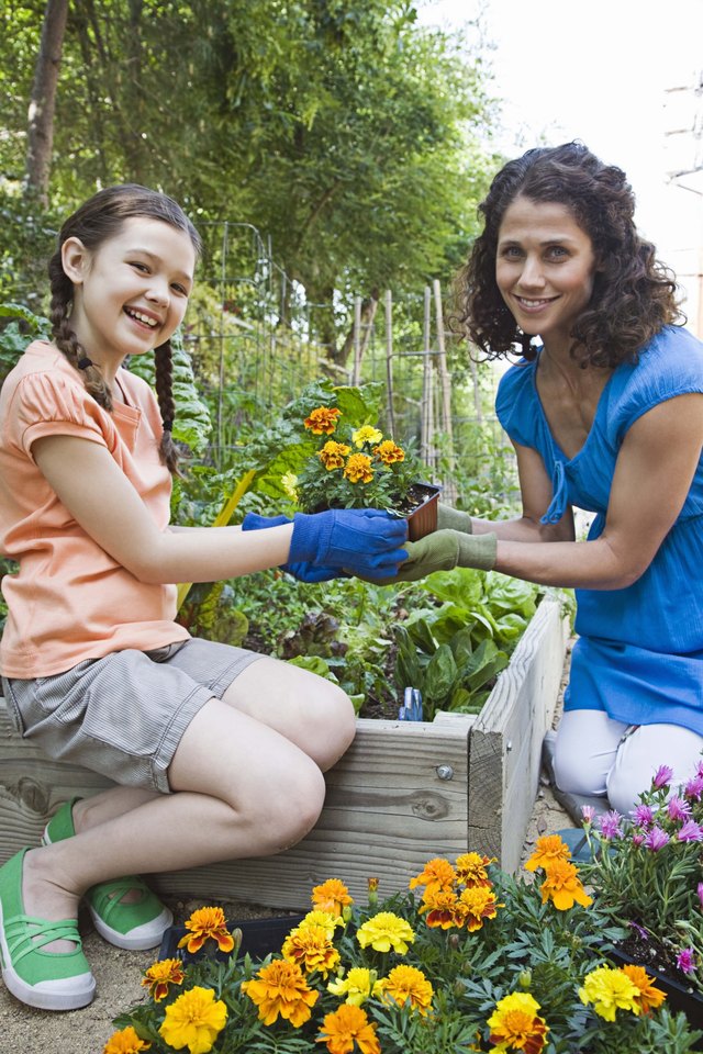 Mother and daughter in garden