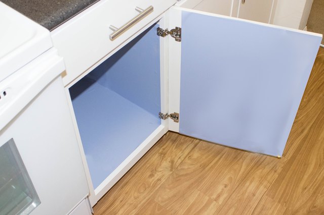 How to Cover Kitchen Cabinets With Vinyl Paper | Hunker