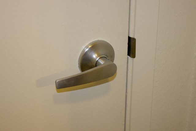 how-to-remove-a-lever-door-handle-without-screws-hunker