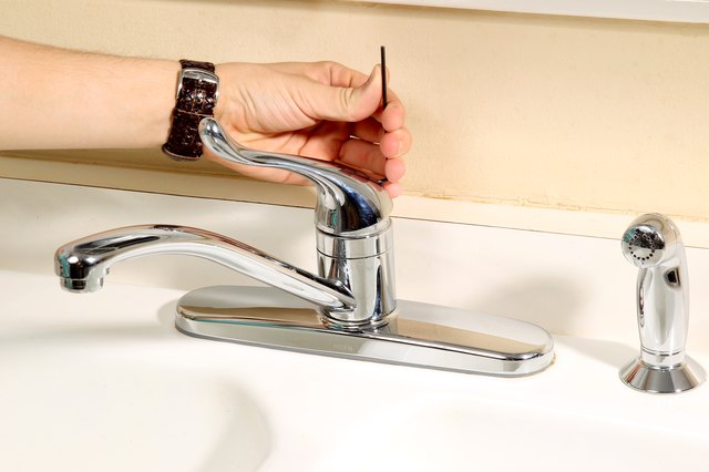i can't remove faucet from moen kitchen sink