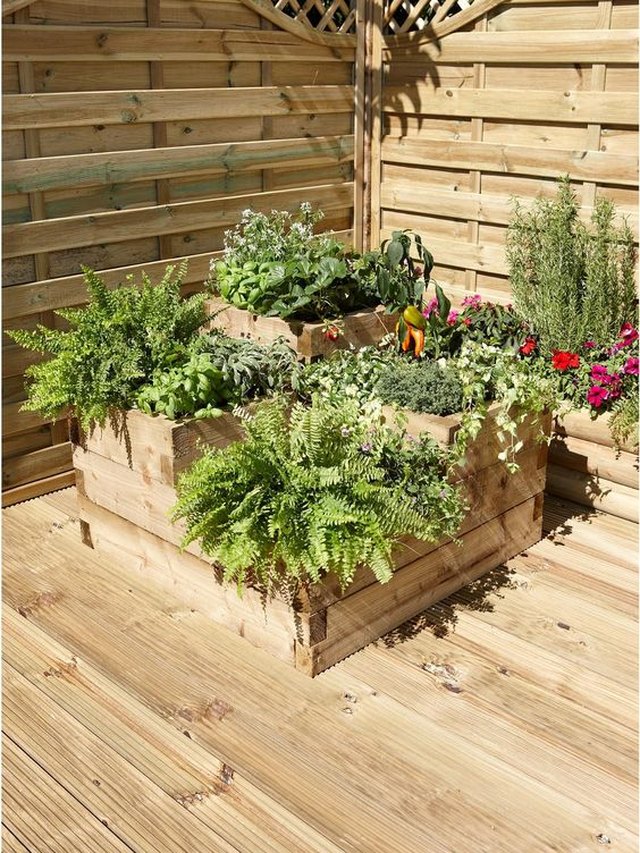 7 raised flower bed ideas to take your garden to the next level | hunker