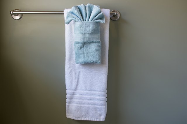 How To Hang Bathroom Towels Decoratively Hunker
