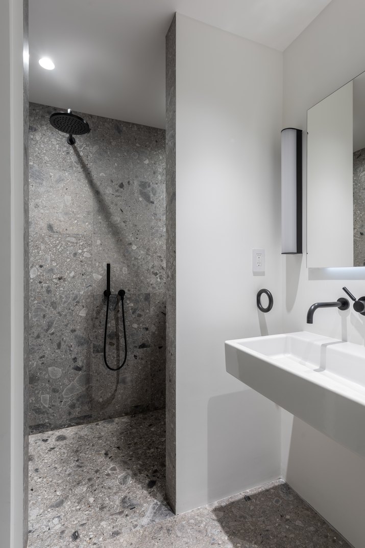 small bathroom with gray marble shower