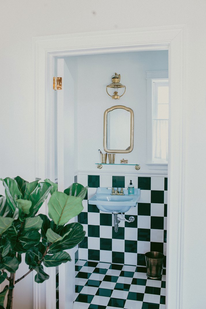 small bathroom with checkerboard tile