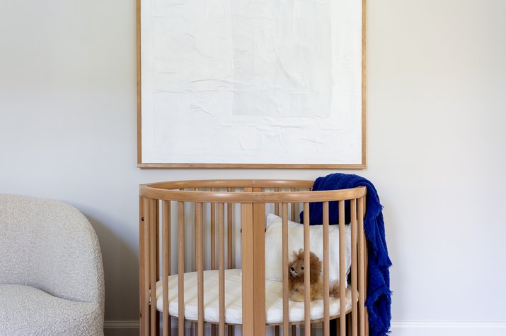 crib in a small guest room nursery combo