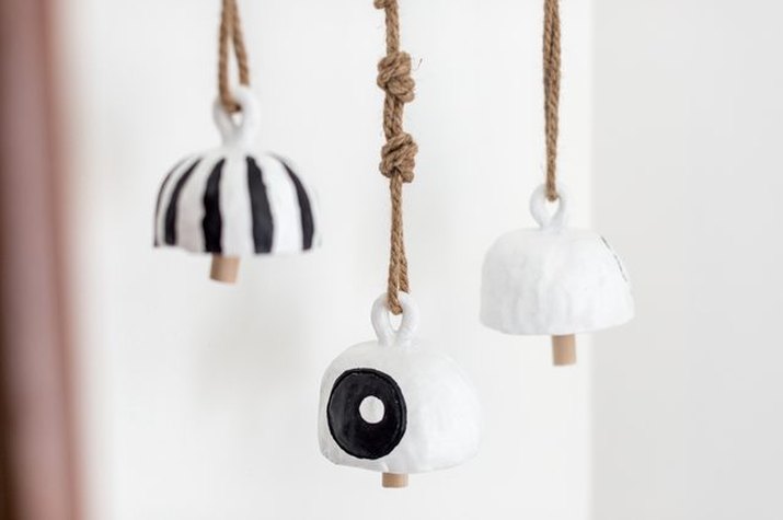 Cute clay bells make for interesting wall hangings