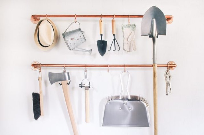 Organize tools in the chicest way possible with copper pipe