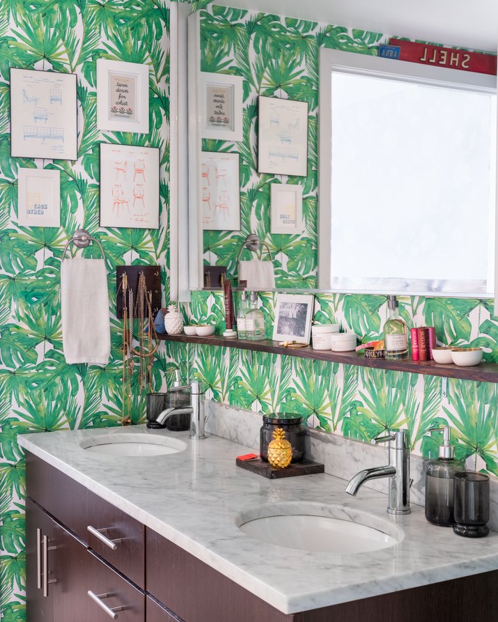 Bathroom with green wallpaper