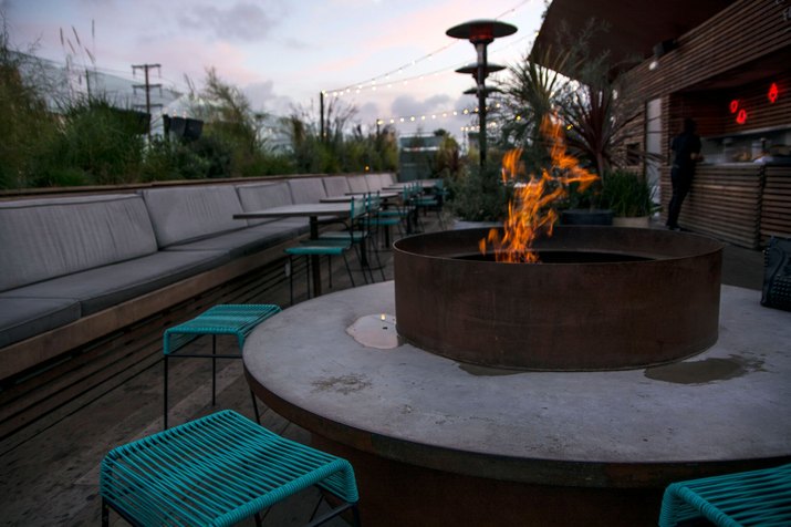 Rooftop bar fire pit.
