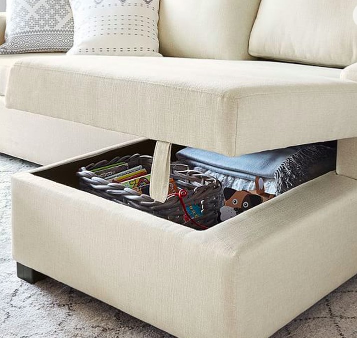 white couch with chaise storage
